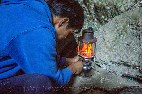 cave guide lits-up kerosene lamp - lumiang cave - sagada (philippines), guide, lamp, lumiang cave, man, natural cave, sagada