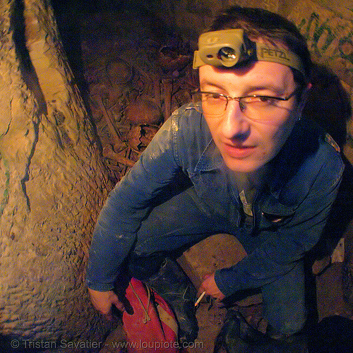 caver - catacombes de paris - catacombs of paris (off-limit area) - bhv in one of the ossuaries, cataphile, cave, clandestines, illegal, ossuary, skeletal remains, skeleton, trespassing, tunnel, underground quarry