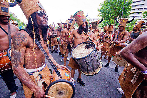 choukaj at the carnaval tropical de paris, caribbean, carnaval tropical, choukaj, costumes, creole, crowd, créole, drummers, drums, guadeloupe, hat, indigenous culture, men, parade, traditional, tribal, west indies