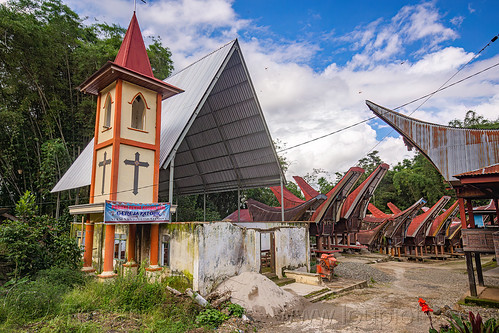 church and traditional toraja rice barns, alang, rice granaries, rice-barns, tana toraja, tongkonan house, tongkonan roof, village