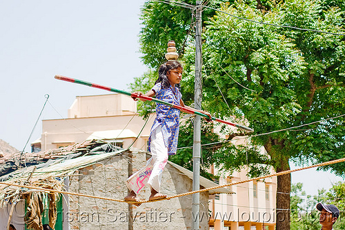 circus performer in village - young girl balancing on slack rope - near udaipur (india), artist, balancing, circus, performer, slack rope, udaipur