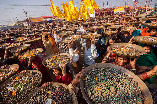 clay shiva lingam's offerings - procession - hindu ceremony - kumbh mela (india), carrying on the head, clay, crowd, hindu ceremony, hindu pilgrimage, hinduism, kumbh mela, lingams, offerings, shiva linga, shiva lingam, shivling, trays, walking, yellow flags