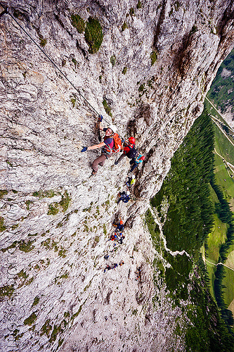 cliff climbing - ascending the via ferrata tridentina - dolomites mountains (italian alps), alps, cliff, climber, climbing harness, climbing helmet, dolomites, dolomiti, ferrata tridentina, mountain climbing, mountaineer, mountaineering, mountains, rock climbing, vertical, via ferrata brigata tridentina, woman