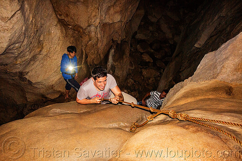 climbing a flowstone - lumiang / sumaguing cave - sagada (philippines), cave formations, cavers, caving, climbing, concretions, flowstone, knotted rope, lumiang cave, natural cave, sagada, speleothems, spelunkers, spelunking, sumaguing cave