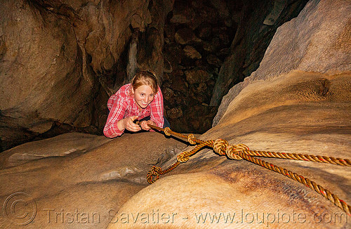 climbing a flowstone - lumiang / sumaguing cave - sagada (philippines), cave formations, cavers, caving, climbing, concretions, flowstone, knotted rope, lumiang cave, natural cave, philippines, sagada, speleothems, spelunkers, spelunking, sumaguing cave