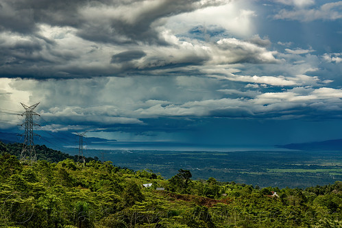 cloudy landscape with view of poso lake, cloudy sky, electricity pylons, electricity transmission towers, high voltage, landscape, poso lake, power line, pylon, transmission line