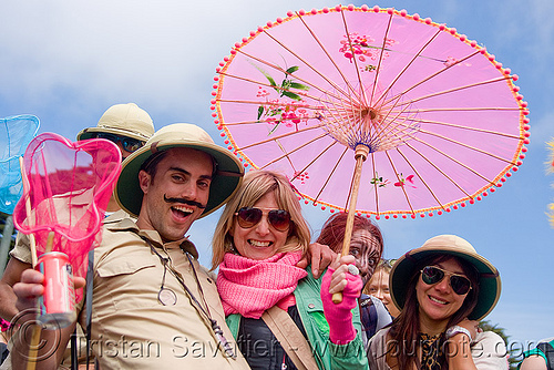 colonial pith helmets and pink japanese umbrella, bay to breakers, colonial pith helmet, costume, footrace, helmets, japanese umbrella, man, pink, street party, woman