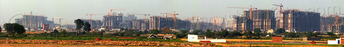 construction of "gaur city 1" & "gaur city 2" - greater noida planned urban development project (india), building construction, buildings, construction cranes, gaur city, greater noida, india, panorama, planned city, urban development, urban planning
