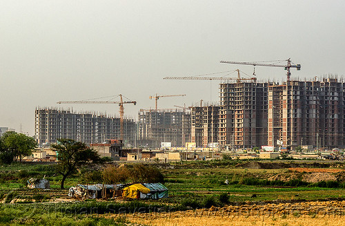 construction of the planned urban developments "gaur city 1" & "gaur city 2" in greater noida (india), building construction, buildings, construction cranes, gaur city, greater noida, planned city, urban development, urban planning