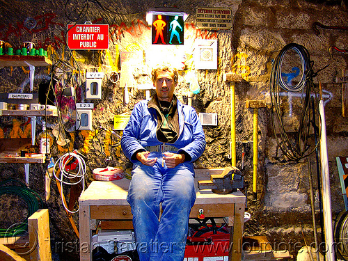 construction worker - tristan savatier, cave, construction worker, contractor, hammers, man, night, safety signs, self portrait, tools, workbench, workspace