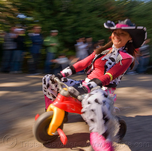 cowgirl - byobw - "bring your own big wheel" race - toy tricycles (san francisco), big wheel, byobw 2011, cowgirl costume, drift trikes, moving fast, potrero hill, race, speed, speeding, toy tricycle, toy trike, trike-drifting, woman