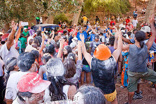 crowd dancing around the apacheta - carnaval de tilcara (argentina), andean carnival, argentina, carnaval de la quebrada, carnaval de tilcara, crowd, dancing, noroeste argentino, quebrada de humahuaca