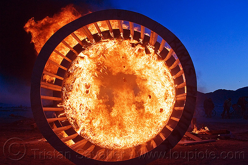 cylindrical wooden frame burning at dusk, burning, cylinder, cylindrical, dusk, fire, frame, wood, wooden