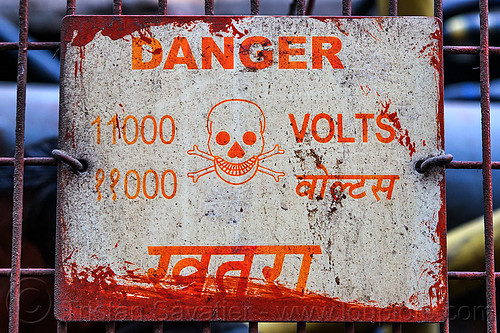 danger 11000 volts sign (india), 11000, crossbones, danger, delhi, electric, electricity, high voltage, india, sign, skull, volts