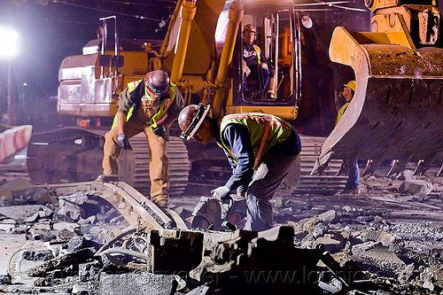 demolition of municipal railway tracks, abrasive saw, bucket attachment, cut-off saw, cutting, demolition, excavator bucket, high-visibility jacket, high-visibility vest, light rail, men, muni, night, ntk, power tool, railroad construction, railroad tracks, railway tracks, reflective jacket, reflective vest, safety helmet, safety vest, san francisco municipal railway, track maintenance, track work, workers