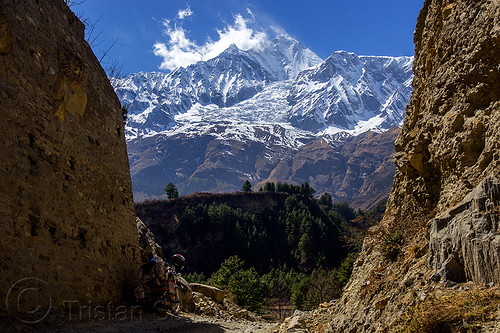 dhaulagiri peak and its glacier (nepal), annapurnas, cliff, cloud, dhaulagiri, dirt road, forest, glacier, house, kali gandaki valley, landscape, motorcycle touring, mountain road, mountains, peak, snow, unpaved