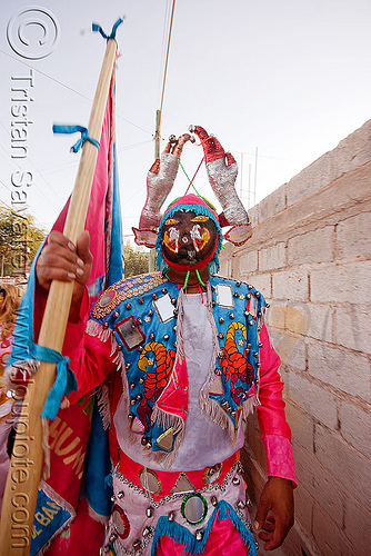 diablo near wall - carnaval de humahuaca (argentina), andean carnival, argentina, careta de diablo, carnaval de la quebrada, carnaval de tilcara, colorful, comparsa, costume, diablo carnavalero, diablo de carnaval, diablos carnavaleros, diablos de carnaval, flag, folklore, indigenous culture, los picaflores, mask, men, mirrors, noroeste argentino, quebrada de humahuaca, quechua culture, tribal