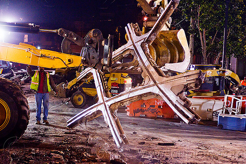 diamond crossing - railroad construction, at work, bucket attachment, demolition, diamond crossing, excavator bucket, front loader, light rail, man, muni, night, ntk, railroad construction, railroad tracks, railway tracks, raúl, san francisco municipal railway, track maintenance, track work, wheel loader, worker, working