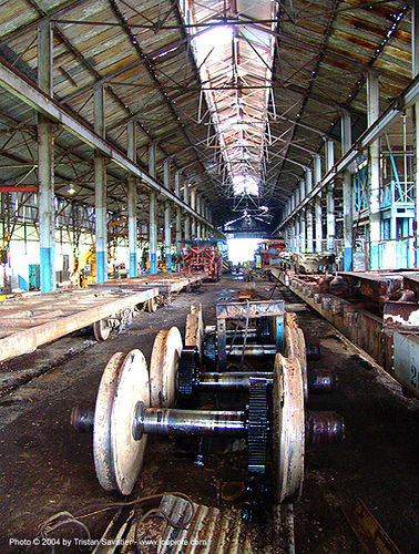 diesel-electric train engine axles - wheels, atlantic railway, axle, costa rica, puerto limon, rusty, train axles, train depot, train engines parts, train wheels, train yard, trespassing