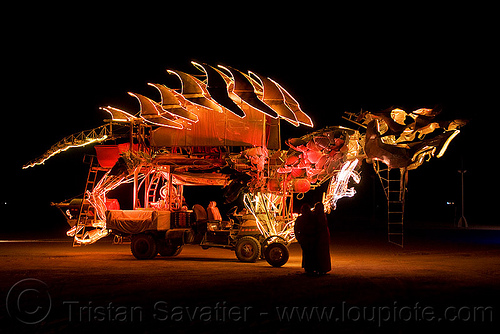 dinosaur art car, art car, burning man art cars, burning man at night, dinosaur, gon kirin, mutant vehicles