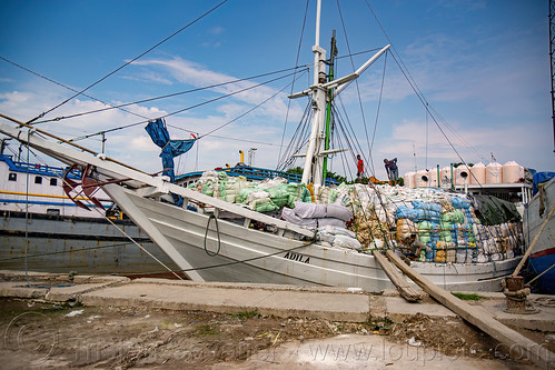 docked bugis schooner "adila" loaded with goods - traditional wooden cargo boats, boats, bugis schooners, dock, harbor, pinisi, ships, surabaya