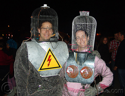 dr megavolt and heather - tesla coil protection costumes, danger, dr megavolt, electric, electricity, fire art, heather, high voltage, tesla coil