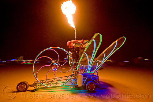 dragonfly art car, art car, burning man art cars, burning man at night, chris merrick, dragonfly, el-wire, fire, glowing, mutant vehicles, now-a-saurus