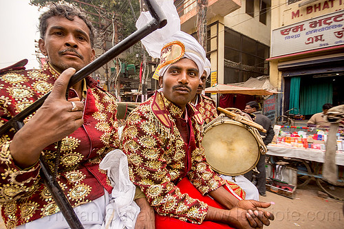 dressed-up musicians with drum on their way to a wedding (india), cycle rickshaw, dressed-up, drum, drummer, headdress, indian wedding, men, music band, musicians, turban, uniform, varanasi