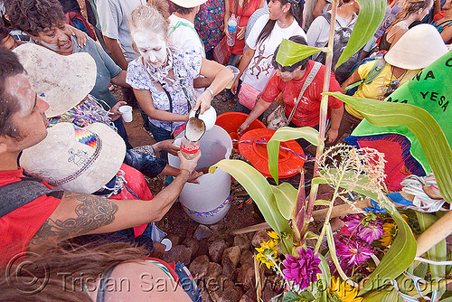 drinking at the apacheta - carnaval de tilcara (argentina), andean carnival, apacheta, argentina, barrel, bucket, carnaval de la quebrada, carnaval de tilcara, drinking, noroeste argentino, quebrada de humahuaca