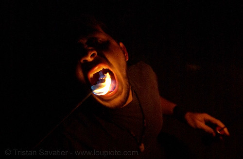eric eating fire (san francisco), eating fire, fire dancer, fire dancing, fire eater, fire eating, fire performer, fire spinning, mouth, night, spinning fire