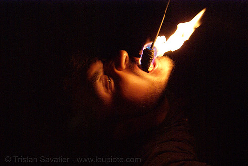 eric eating fire (san francisco), eating fire, fire dancer, fire dancing, fire eater, fire eating, fire performer, fire spinning, mouth, night, spinning fire