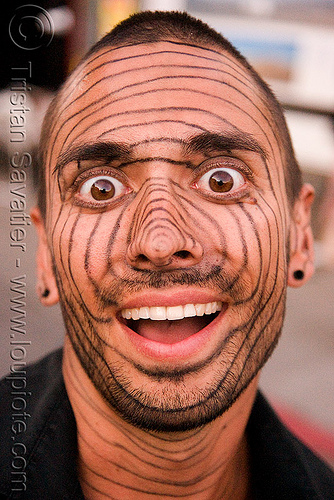 face paint - makeup - crazy-looking guy - burning man decompression 2008 (san francisco), concentric circles, crazy-looking, face painting, facepaint, guy, makeup, man