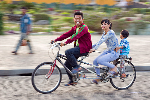 family riding tandem bike, boy, child, family, girl, jakarta, kid, man, medan merdeka, merdeka square, moving, park, riding, road, tandem bicycle, tandem bike, woman