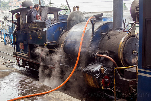 filling-up steam locomotive with water - darjeeling train station (india), 788 tusker, darjeeling himalayan railway, darjeeling toy train, filling-up, hose, men, narrow gauge, operators, railroad, smoke, smoking, steam engine, steam locomotive, steam train engine, train station, workers