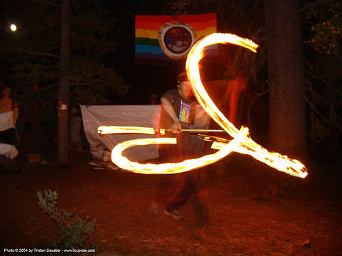 fire-dancer - rainbow gathering - hippie, fire dancer, fire dancing, fire performer, fire spinning, fire staff, hippie, night, spinning fire