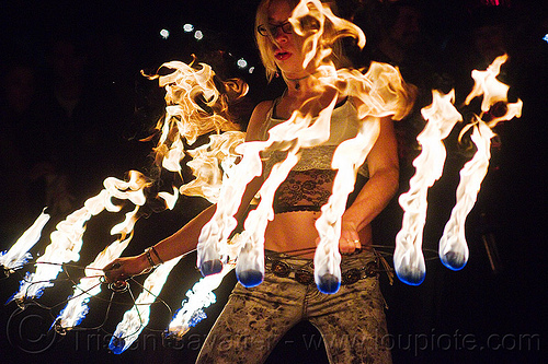 fire dancer with fire fans, american steel studios, cressie mae, fire dancer, fire dancing, fire fans, fire performer, fire spinning, holidays in flux, night, poplar gallery, spinning fire, woman
