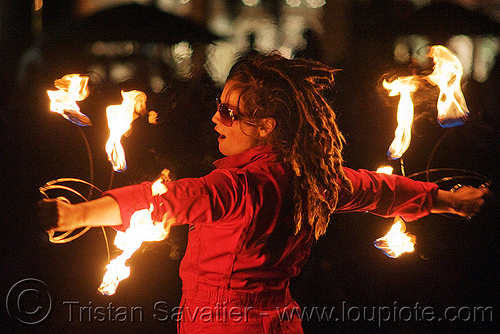 fire fans - performer - temple of poi 2010 fire dancing expo (san francisco), fire dancer, fire dancing expo, fire fans, fire performer, fire spinning, night, red, temple of poi, union square, woman