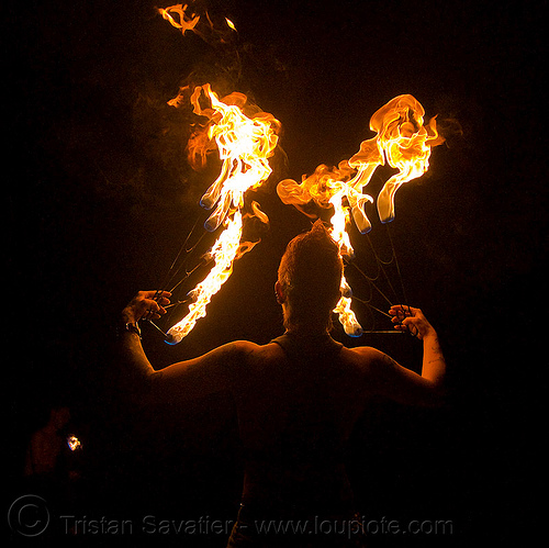 fire fans (san francisco) - fire dancer - leah, backlight, fire dancer, fire dancing, fire fans, fire performer, fire spinning, leah, night, spinning fire, tattooed, tattoos, woman