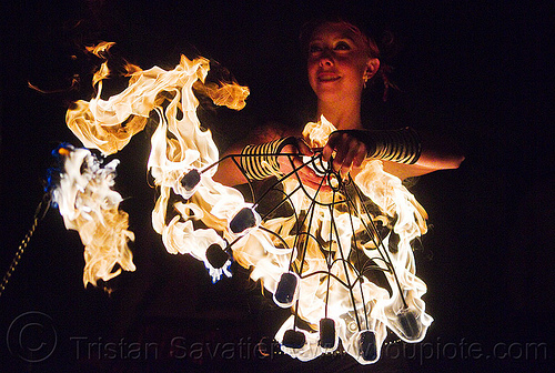 fire performer with fire fans, american steel studios, fire dancer, fire dancing, fire fans, fire performer, fire spinning, holidays in flux, night, poplar gallery, samantha, spinning fire, woman