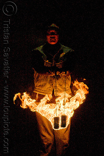 fire performer with poi - temple of poi 2009 fire dancing expo - union square (san francisco), fire dancer, fire dancing expo, fire performer, fire poi, fire spinning, man, night, spinning fire, temple of poi