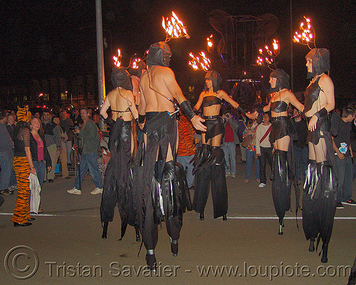 fire performers on stilts, fire art, stilts, stiltwalkers, stiltwalking