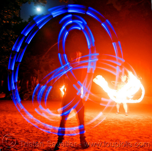 fire performers - spinning light poi - flowlights (san francisco), fire dancer, fire dancing, fire performer, fire spinning, glowing, led lights, led poi, led staff, light poi, light staffs, nicky evers, night, spinning fire