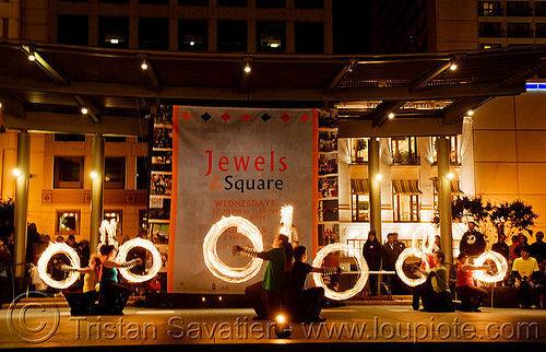 fire performers spinning poi - temple of poi 2009 fire dancing expo - union square (san francisco), fire dancer, fire dancing expo, fire performer, fire poi, fire spinning, night, spinning fire, temple of poi