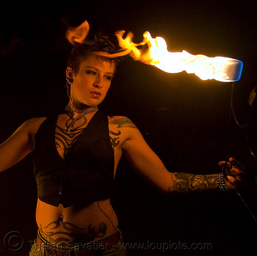 fire staff (san francisco) - fire dancer - leah, fire dancer, fire dancing, fire fans, fire performer, fire spinning, leah, night, spinning fire, tattooed, tattoos, woman