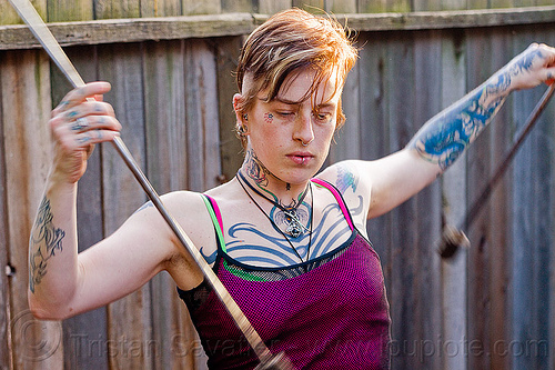 fire staffs practice, fire staffs, fire staves, leah, tattooed, tattoos, woman