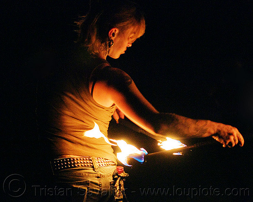 fire staves - hips - leah, fire dancer, fire dancing, fire performer, fire spinning, fire staffs, fire staves, leah, night, tattooed, tattoos, woman