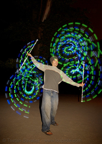 flowstaffs - elias spinning led staffs (san francisco), double staff, elias, fire dancer, fire dancing, fire performer, fire spinning, flowstaffs, glowing, led lights, led staffs, light staffs, night, spinning fire, staves