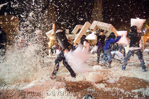 flying feathers on justin herman plaza - the great san francisco pillow fight 2009, down feathers, night, pillows, world pillow fight day