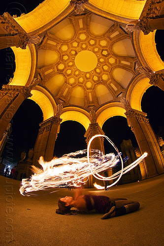 frankey laying on her back - spinning fire hoop - fire dancer at the palace of fine arts, arches, dome, fire dancer, fire dancing, fire hoop, fire performer, fire spinning, frankey, night, palace of fine arts, vaults, woman