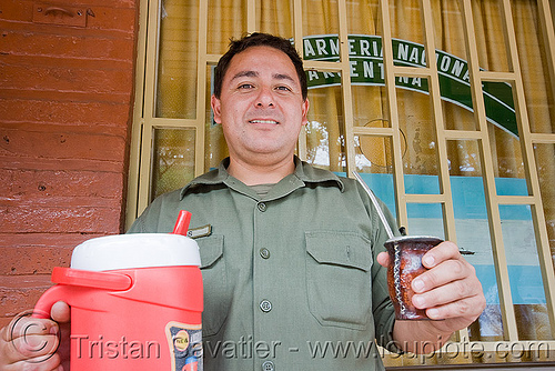 gendarme drinking mate (argentina), andean carnival, argentina, carnaval de la quebrada, cop, gendarme, gendarmería nacional, gna, jujuy capital, law enforcement, man, noroeste argentino, police, porongo, san salvador de jujuy, uniform, yerba mate